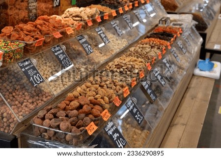 Moscow, Russia - July 21. 2023. Sale of dried fruits and nuts at farmer's market in Zelenograd