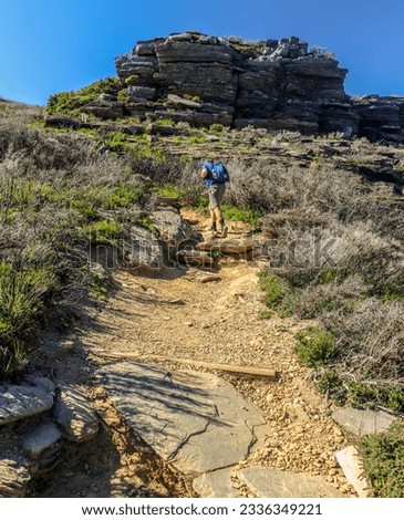Man hiking up a rocky path on Bluff Knoll, Stirling Ranges Western Australia Royalty-Free Stock Photo #2336349221