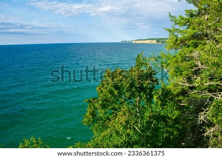 Amazing view of Lake Superior and Grand Island from Lower Outlook at Miner's Castle in Pictured Rocks National Lakeshore in Michigan UP. This is a huge natural attraction in Pure Michigan's Up North.