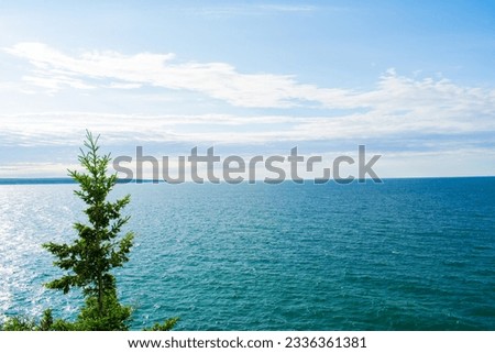 Amazing view of Lake Superior and Grand Island from Lower Outlook at Miner's Castle in Pictured Rocks National Lakeshore in Michigan UP. This is a huge natural attraction in Pure Michigan's Up North.