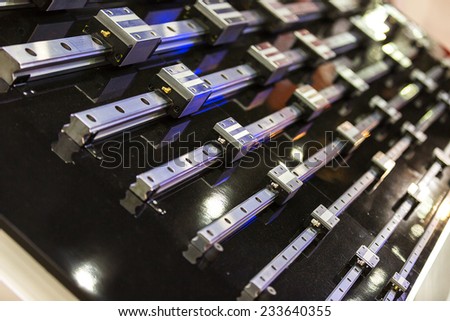 linear motor guide & LM Guide part of machine Royalty-Free Stock Photo #233640355