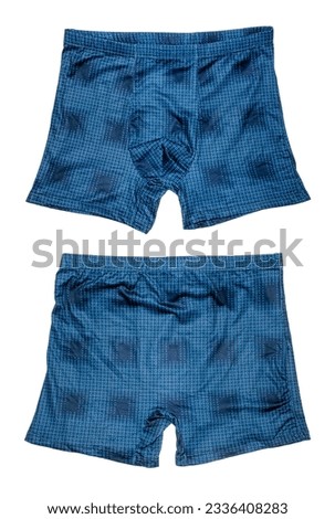 Blue boxer briefs on a white background.Men's swimming trunks with patterns.The briefs are tight-fitting.Swimming trunks background.
