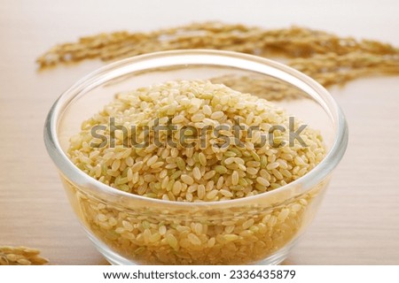 A lot of germ brown rice served in a glass bowl Royalty-Free Stock Photo #2336435879