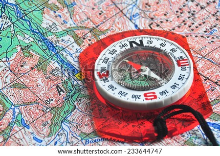 The compass on the map. The magnetic compass is located on a topographic map.