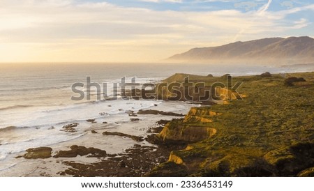 Aerial view of the scenic Cliffs. Big Sur coastline panorama at sunset, California, USA.  Royalty-Free Stock Photo #2336453149