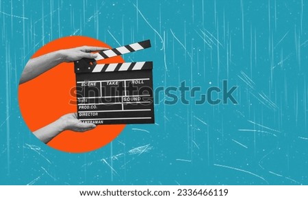 Hands holding clapper board making video cinema in studio. Movie production clapper board. Action, theatre day Royalty-Free Stock Photo #2336466119