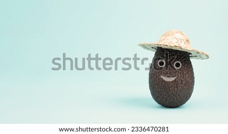 Avocado with a smiling happy face and a hat, vegan food, healthy diet, vegetarian lifestyle