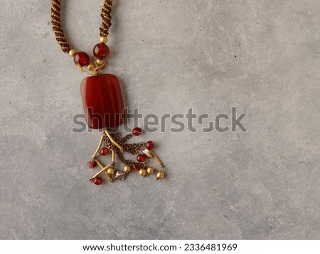 Elegant jewelry set ring, necklace and earrings with diamonds.Product still life concept. Modern and decorative textured background.