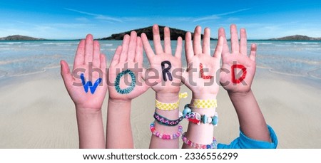 Children Hands Building Word World, Ocean And Sea