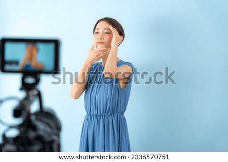 Beautiful Japanese woman posing in front of the camera