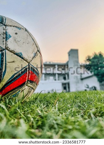 Aesthetic picture of  Football lying on the football field .