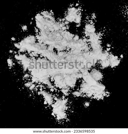 White powder isolated overlay on black background. Royalty high-quality free stock photo image of flour explosion freeze stop motion object design