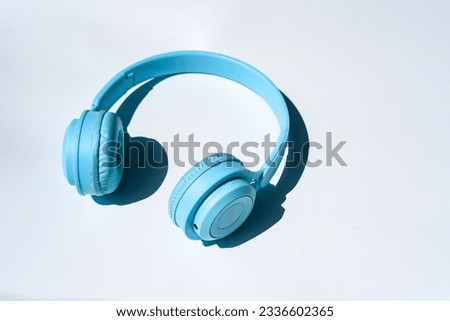 Wireless gaming headset over white background.