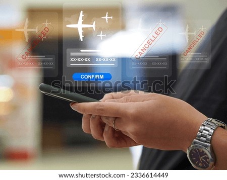 Confirm flight booking A young woman who is checking confirmation of a single plane ticket that can fly on other airlines that have been canceled Royalty-Free Stock Photo #2336614449