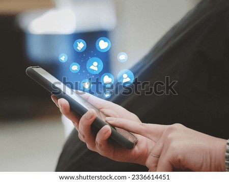 young woman using smartphone on social media social media application, likes and love and comment