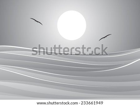 Waves on the sea and a silhouette of birds in the sky