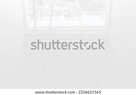 white tile floor in office.White tiles floor for bedroom , kitchen, bathroom and interior design.White tiles floor in perspective view. Clean and symmetrical surface with grid texture background.