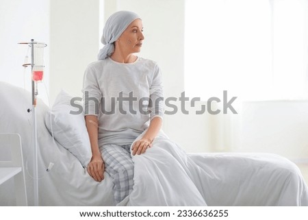 Mature woman after chemotherapy in clinic Royalty-Free Stock Photo #2336636255