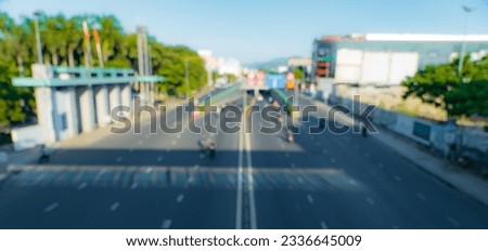 Blurred street background shot from above with boulevard road and traffic in the morning.  Traffic concept.
