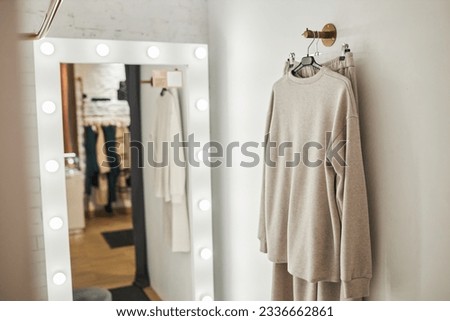 Minimal background image of dressing room setup with big vanity mirror, copy space Royalty-Free Stock Photo #2336662861