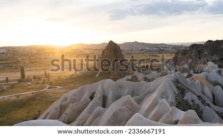 Beautiful landscape picture of the sunset from a volcanic mountain formation in the Cappadocia Turkey from the mountains on a summer day