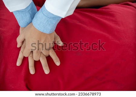 man has practiced cardiopulmonary resuscitation CPR for patients with sudden cardiac arrest. man able to help Cardiopulmonary CPR people who have had cardiac arrest to return to consciousness again.
 Royalty-Free Stock Photo #2336678973