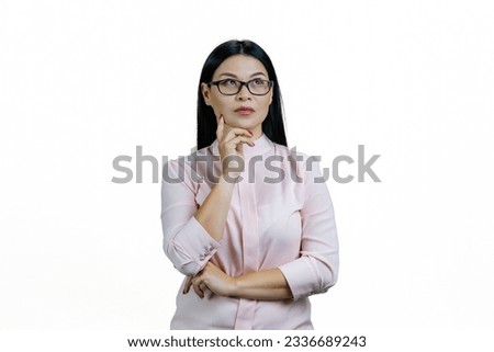 Portrait of smart thoughtful asian businesswoman is looking up. Isolated on white background.