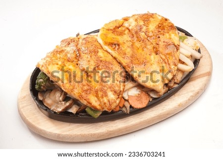 Chicken sizzling steak. Is a popular Italiyan - continetal delicacy all over Japanese. Arabic, Chinese cuisine pictures, isolated on White background.