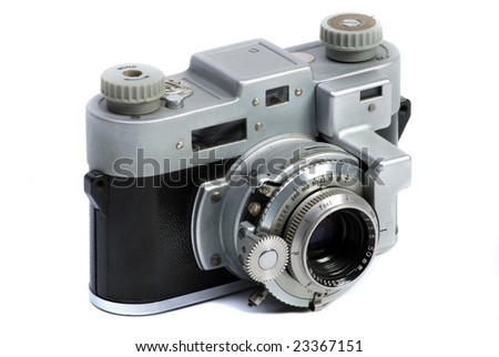 Old  35 mm metal chrome photo camera with lens