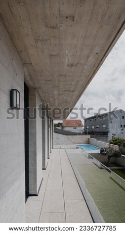 Architectural details of a modern house built in stone and concrete