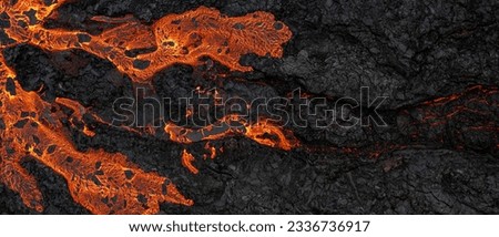 Aerial view of the texture of a solidifying lava field, close-up Royalty-Free Stock Photo #2336736917