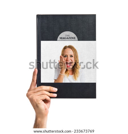 Girl doing surprise gesture printed on book