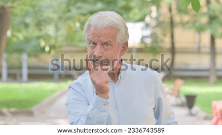 Outdoor Portrait of Angry Senior Old Man Arguing and Fighting Royalty-Free Stock Photo #2336743589