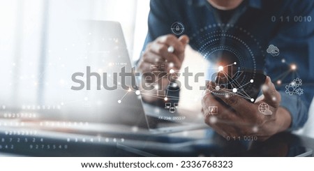 Digital technology, cloud computing concept. Software engineer using mobile smart phone and laptop computer with global network connection, Technology, innovative and communication concept.