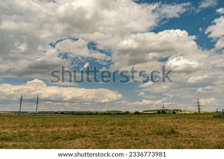 beautiful blue sky with many white big clouds in Troja, Prague in July