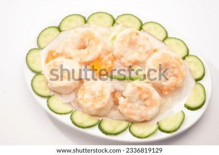 Prawn garlic souce. (shrimp) Is a popular Chinese-Japanese delicacy all over Japanese. Arabic, Chinese cuisine pictures, isolated on White background.