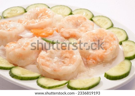 Prawn garlic souce. (shrimp) Is a popular Chinese-Japanese delicacy all over Japanese. Arabic, Chinese cuisine pictures, isolated on White background.