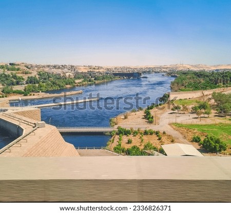 Aswan High Dam beautiful sunny day panorama, Egypt Royalty-Free Stock Photo #2336826371