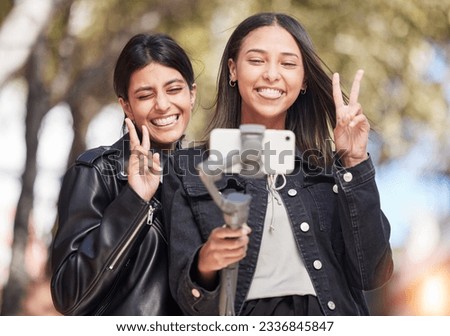 Wink, selfie and peace sign with friends in city for social media, happy and support. Happiness, profile picture and live streaming with women outdoor for internet, post and youth together