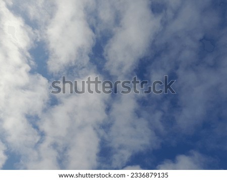 The white clouds on the blue sky are perfect for the background. Skyscape on Lombok Island, Indonesia