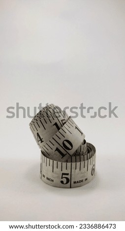 meter to measure clothes or cloth with a length of one meter with a white background