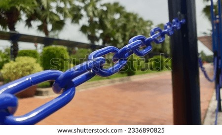 Chains, are used for dividing space. Royalty-Free Stock Photo #2336890825