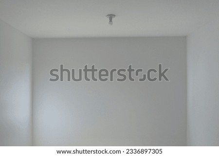 Empty room with white walls and depth Royalty-Free Stock Photo #2336897305