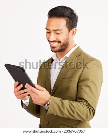 Asian man, business and tablet in studio for online planning, stock market research and internet info on white background. Happy trader, digital technology and network connection for app on website
