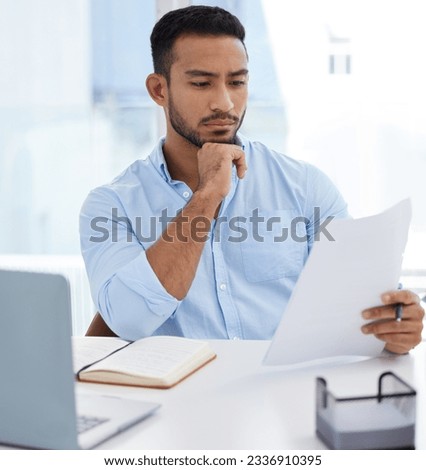 Reading, documents and business man thinking, problem solving or looking for solution in office workplace. Computer, paperwork and serious male professional read report, planning or focus on contract Royalty-Free Stock Photo #2336910395