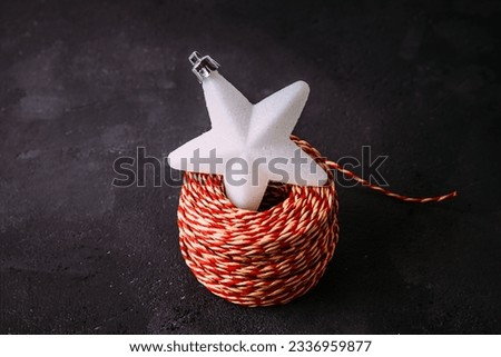 Christmas decor on dark background. Xmas holiday composition, ornament. Copy space.