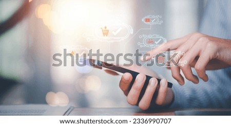 Consumers order in online stores ,Consumer society ,online stores and shop on the internet ,ecommerce store ,online shopping concept ,convenience ,shopping basket ,show orders for products Royalty-Free Stock Photo #2336990707