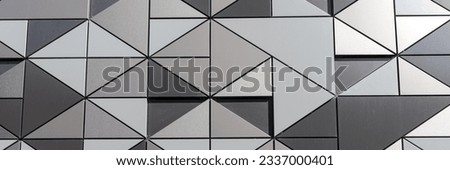 Panoramic image. Wall paneling with mosaic triangle background pattern. 3d optics