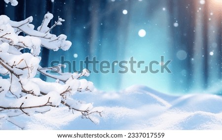 Beautiful winter background with snow-covered branches and snowdrifts against a blurry Christmas forest.