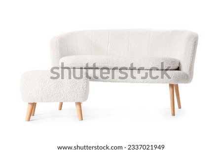 Cozy sofa and pouf isolated on white background Royalty-Free Stock Photo #2337021949
